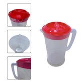 Transparent jug with red lid